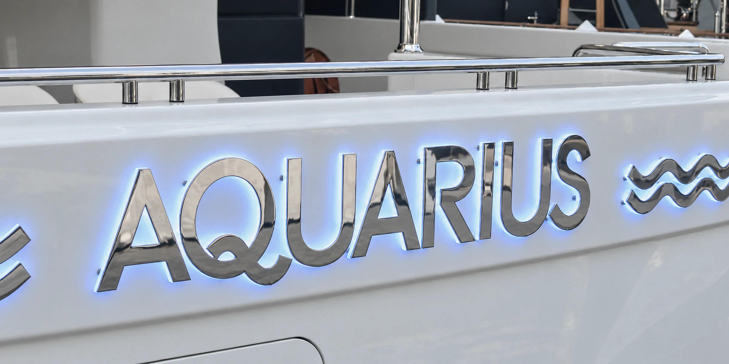 Illuminated stainless lettering